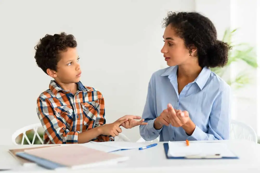 Mom teaching her unhappy middle school student to learn independently
